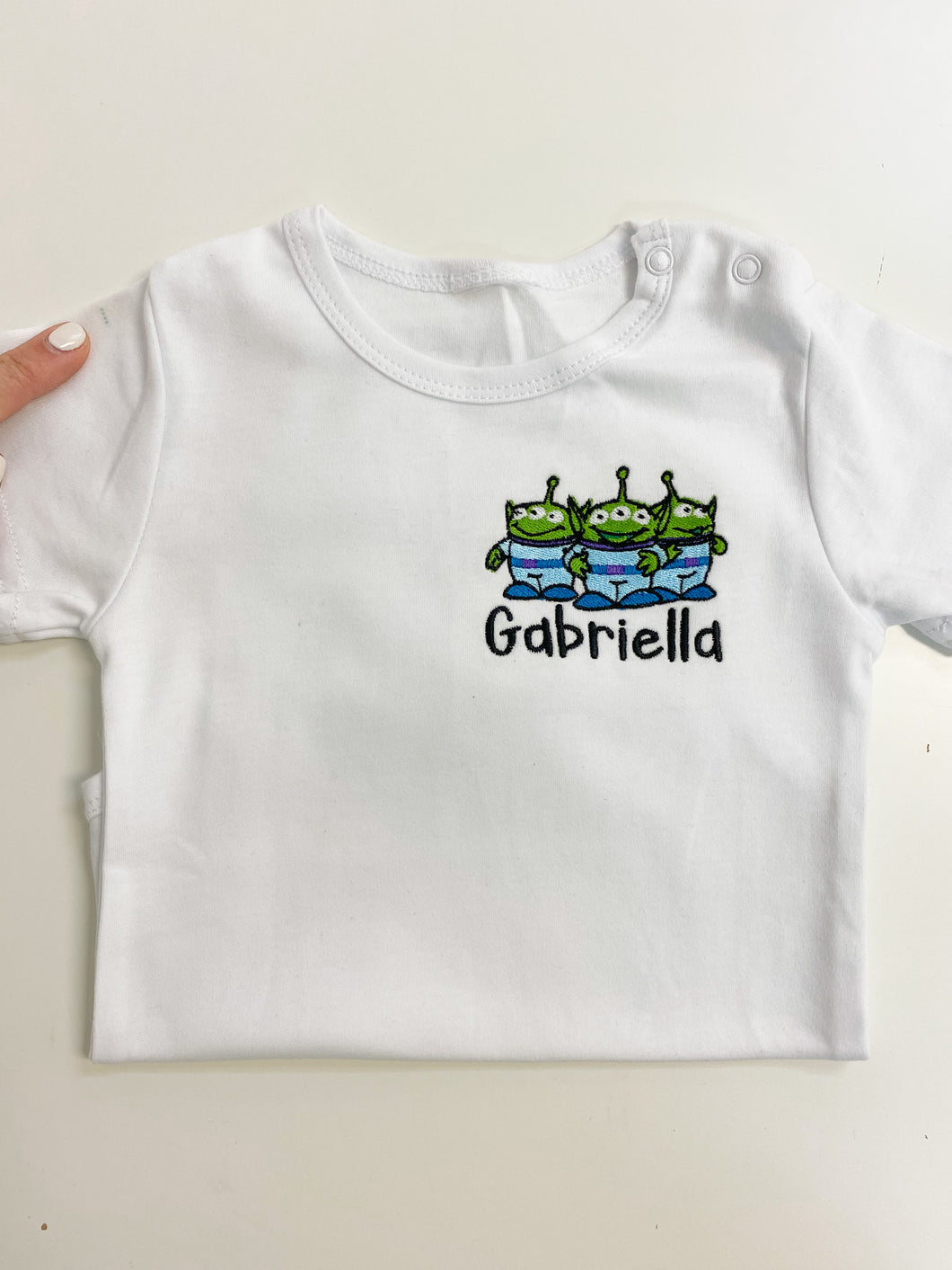 Gabriella 12m Onesie - Small Fabric Flaw on the sleeve